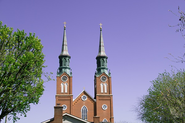 Twin-spired cathedral against a blue sky